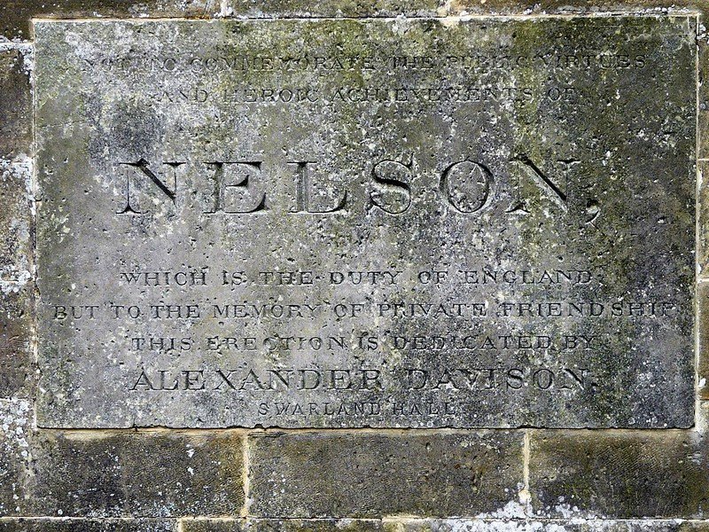 Stone plaque dedicated to Nelson by Alexander Davison, inscribed with a message commemorating friendship and public virtues.