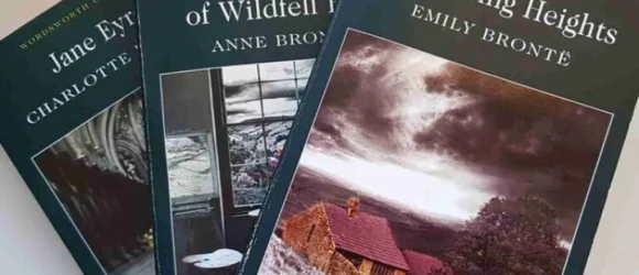 Three classic novels by the Brontë sisters: "Jane Eyre" by Charlotte Brontë, "The Tenant of Wildfell Hall" by Anne Brontë, and "Wuthering Heights" by Emily Brontë, displayed overlapping with visible cover art.